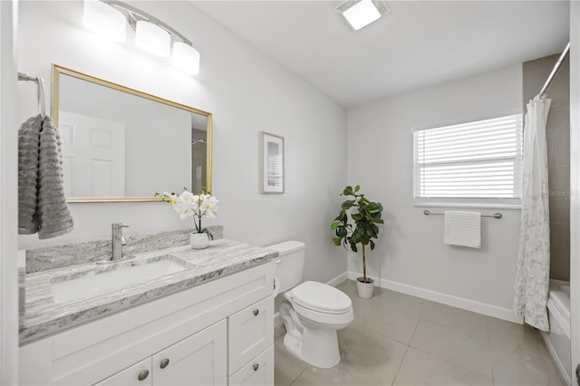 bathroom with visible vents, baseboards, toilet, tile patterned flooring, and vanity