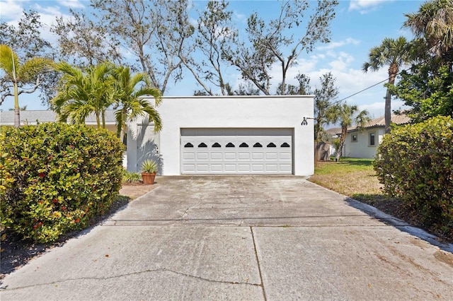 exterior space featuring concrete driveway