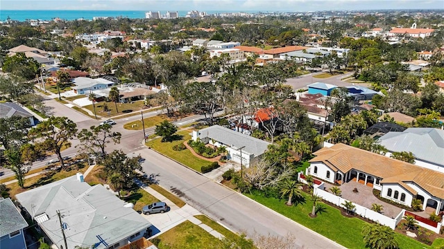 aerial view featuring a residential view and a water view