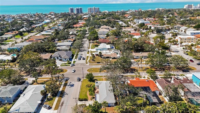 bird's eye view featuring a residential view and a water view