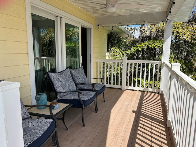 wooden deck with ceiling fan