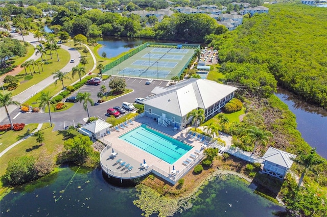 birds eye view of property featuring a water view