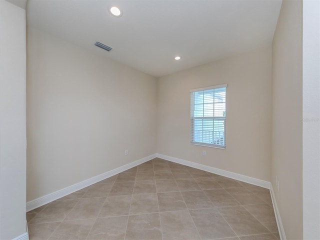 spare room featuring recessed lighting, visible vents, baseboards, and light tile patterned floors