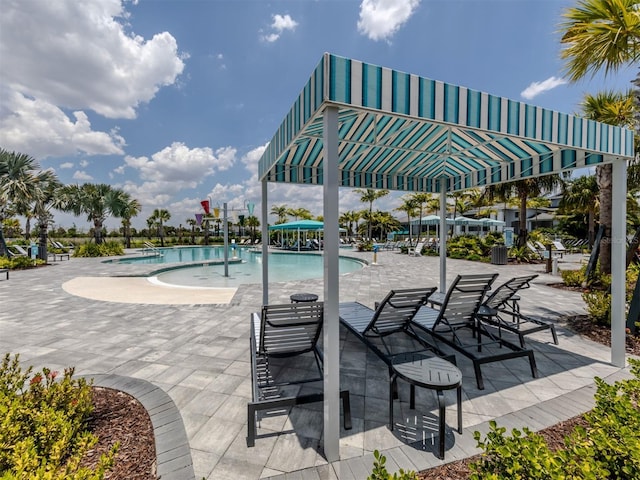 community pool with a patio