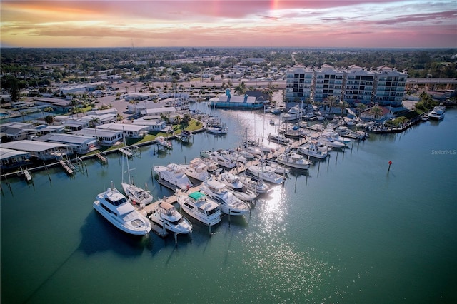 aerial view at dusk with a water view