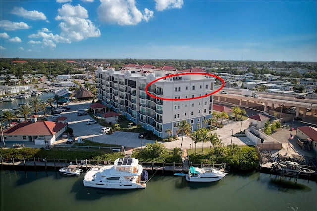 drone / aerial view with a water view