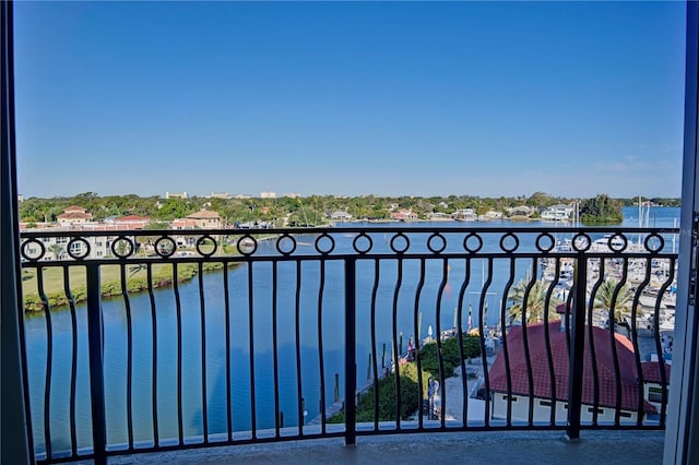 balcony featuring a water view