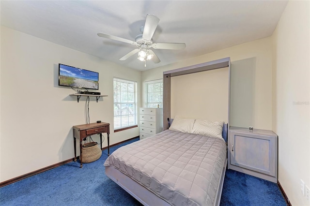 carpeted bedroom featuring ceiling fan and baseboards