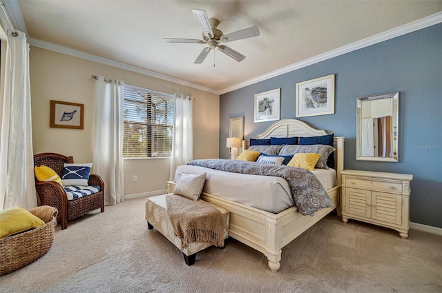 bedroom featuring light carpet, crown molding, baseboards, and ceiling fan