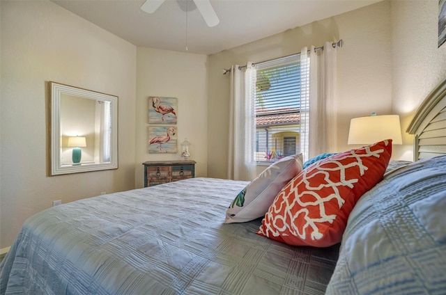 bedroom featuring ceiling fan