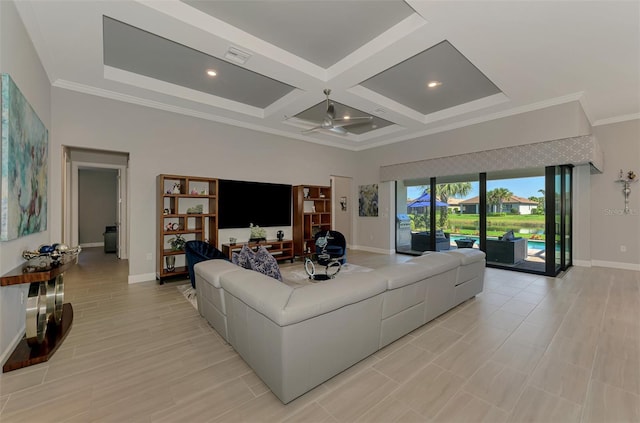 living room featuring a high ceiling, coffered ceiling, baseboards, ornamental molding, and light wood-type flooring