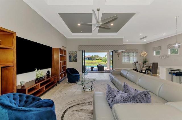 living room featuring recessed lighting, light tile patterned floors, crown molding, and ceiling fan