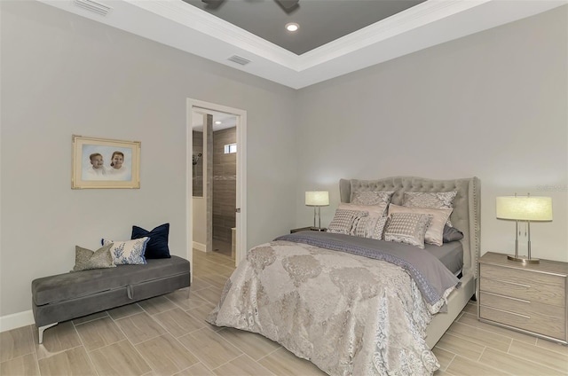 bedroom with recessed lighting, a raised ceiling, visible vents, ornamental molding, and baseboards