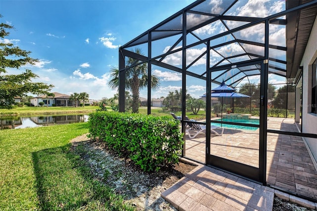 view of patio with a lanai, a water view, and a pool with connected hot tub