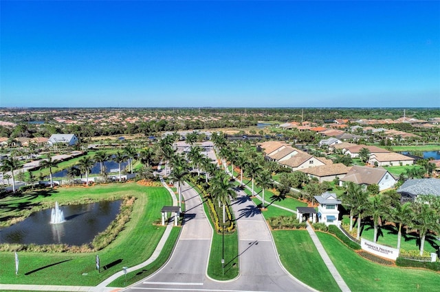 bird's eye view featuring a residential view and a water view