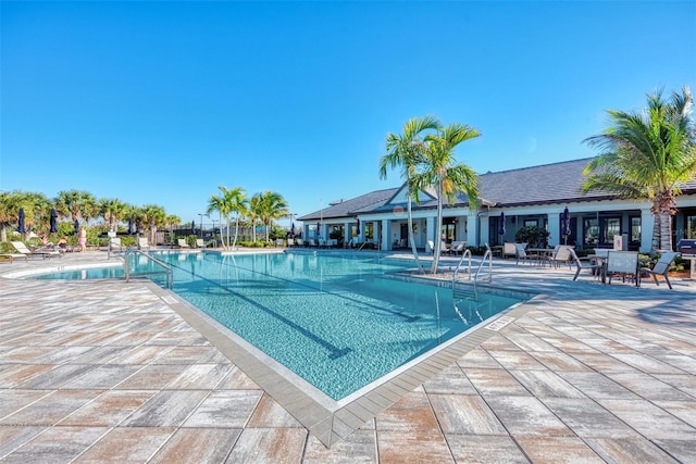 pool with a patio