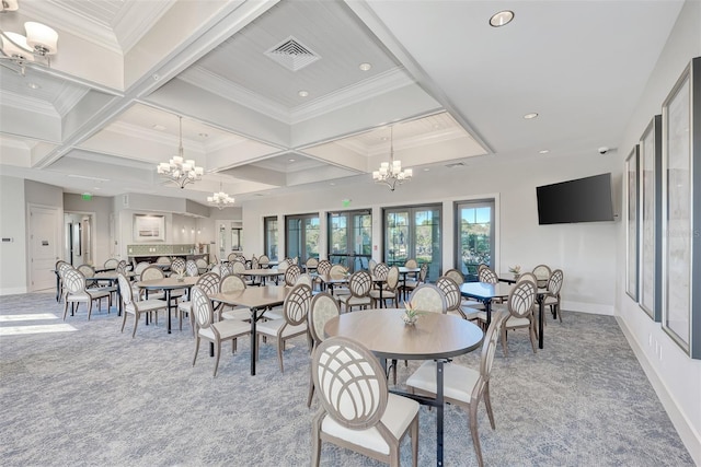 dining room featuring a chandelier, visible vents, light carpet, and coffered ceiling