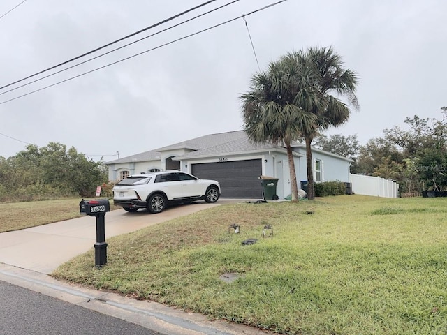 3650 S Sumter Blvd, North Port, FL 34287 - view of front of property featuring concrete driveway and an attached garage