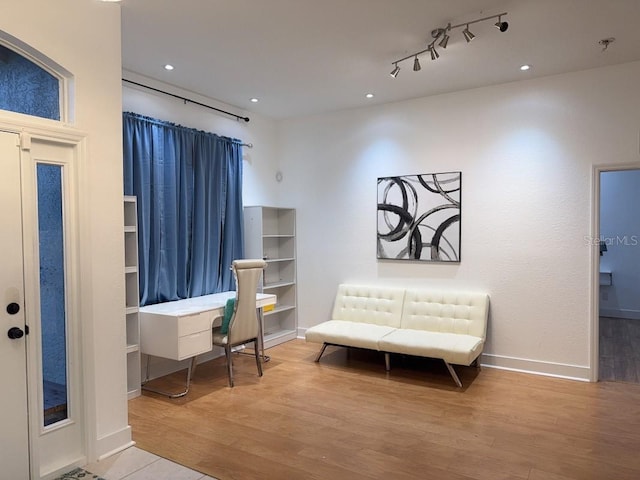 3650 S Sumter Blvd, North Port, FL 34287 - sitting room with wood finished floors, baseboards, rail lighting, an office area, and recessed lighting