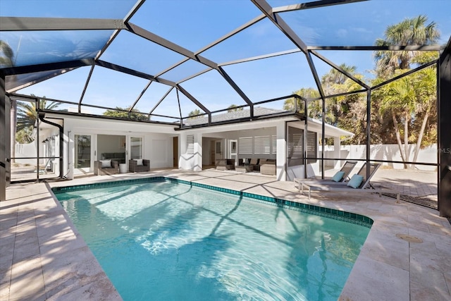 view of swimming pool featuring a patio, a fenced in pool, and an outdoor hangout area