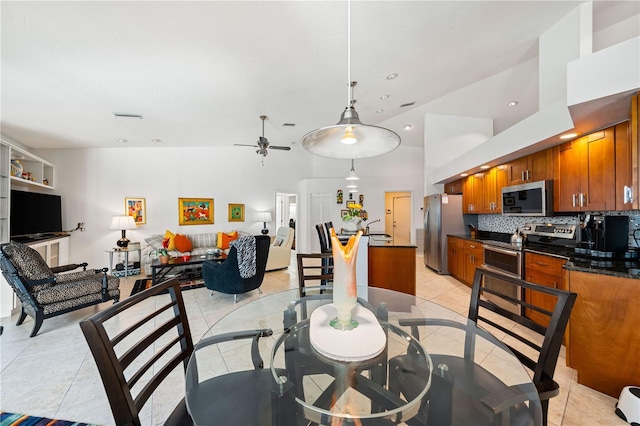 dining space with a ceiling fan, recessed lighting, light tile patterned flooring, and visible vents