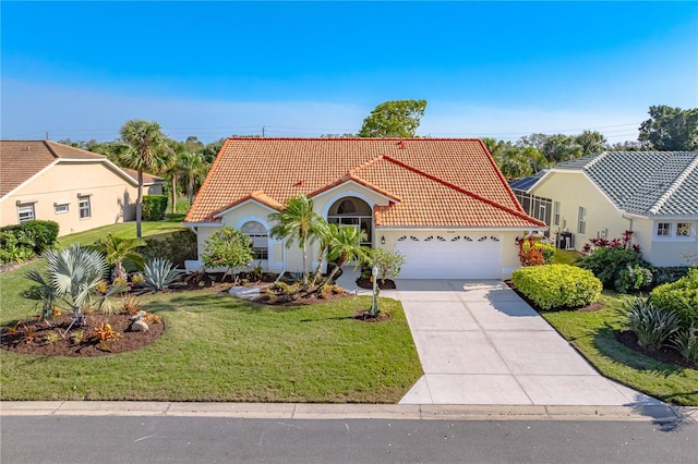 mediterranean / spanish-style home featuring an attached garage, a tiled roof, driveway, stucco siding, and a front lawn