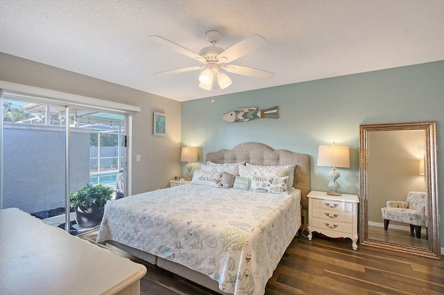 bedroom with dark wood-style floors, access to outside, a textured ceiling, and a ceiling fan