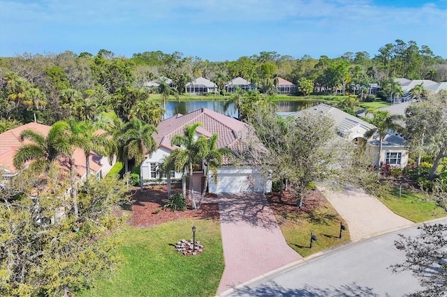 drone / aerial view with a water view