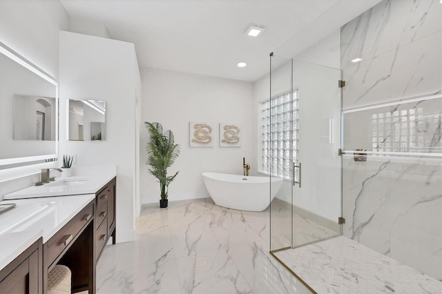 bathroom featuring recessed lighting, vanity, marble finish floor, a soaking tub, and a marble finish shower