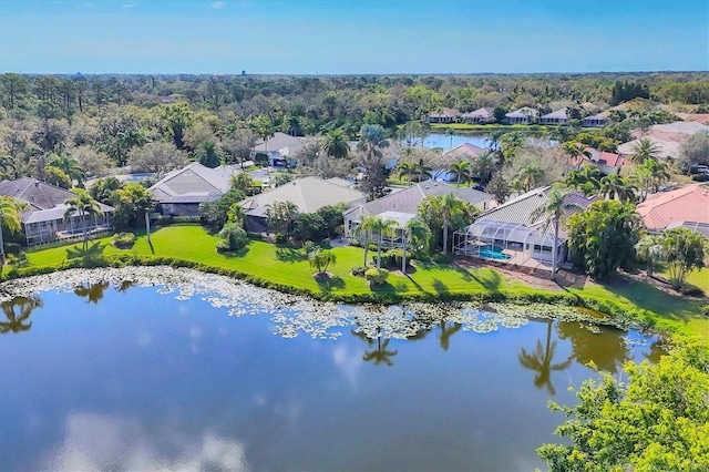 aerial view with a water view and a residential view