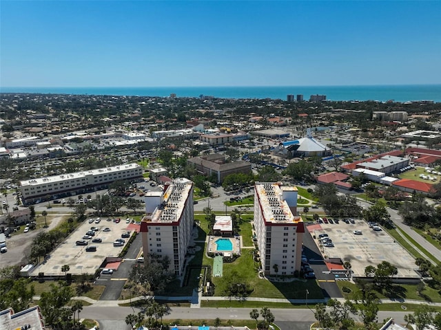 bird's eye view featuring a view of city and a water view