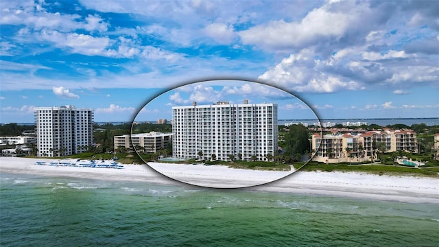 aerial view featuring a water view and a city view