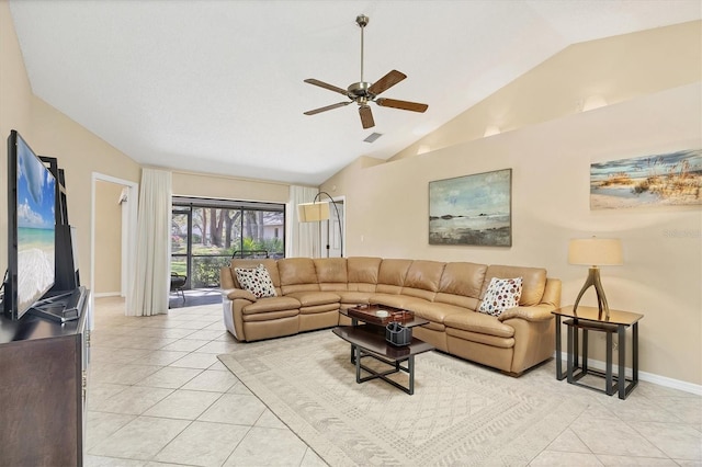 living room with visible vents, a ceiling fan, light tile patterned flooring, vaulted ceiling, and baseboards