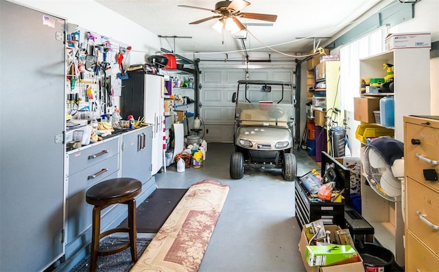 garage featuring ceiling fan