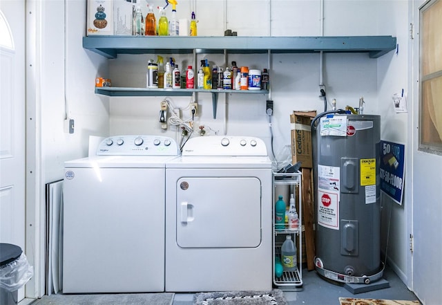 laundry area with laundry area, independent washer and dryer, and electric water heater