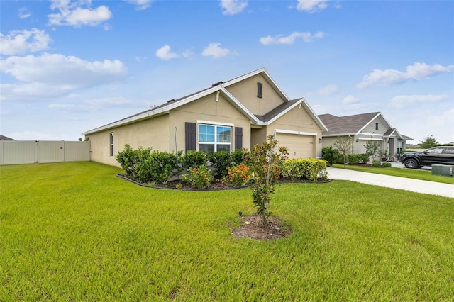 4918 Gray Owl Ter, Palmetto, FL 34221 - single story home featuring a gate, stucco siding, concrete driveway, and a garage