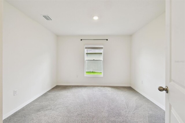 4918 Gray Owl Ter, Palmetto, FL 34221 - unfurnished room featuring carpet and baseboards