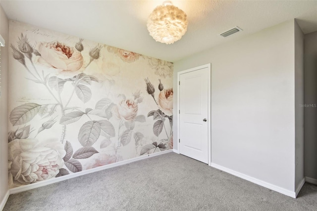4918 Gray Owl Ter, Palmetto, FL 34221 - unfurnished room with carpet flooring and a chandelier