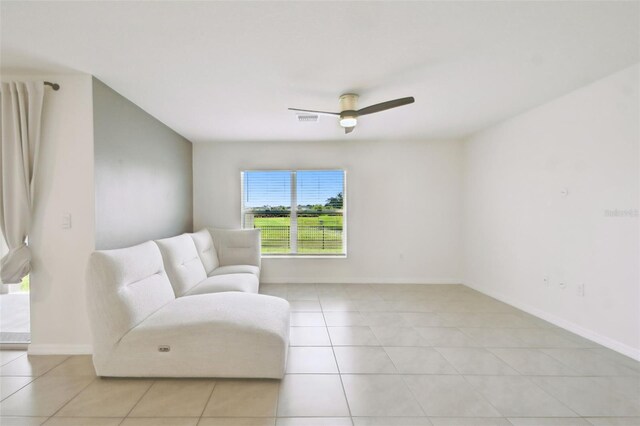 4918 Gray Owl Ter, Palmetto, FL 34221 - living area with ceiling fan and light tile patterned flooring