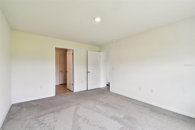 4918 Gray Owl Ter, Palmetto, FL 34221 - unfurnished bedroom featuring carpet floors and baseboards