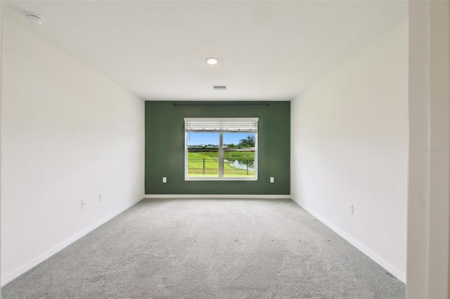 4918 Gray Owl Ter, Palmetto, FL 34221 - carpeted spare room with a smoke detector and baseboards