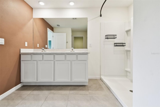 4918 Gray Owl Ter, Palmetto, FL 34221 - full bath with double vanity, tile patterned floors, and a shower