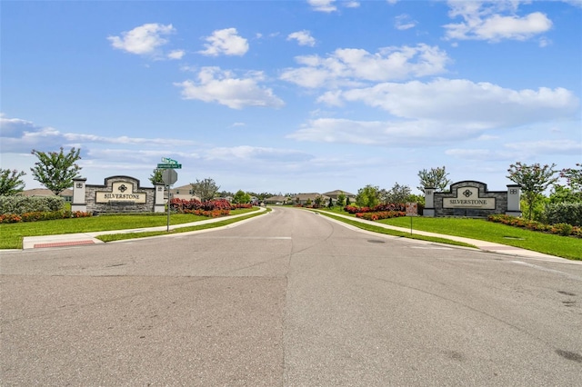 4918 Gray Owl Ter, Palmetto, FL 34221 - view of asphalt street with sidewalks, curbs, and traffic signs