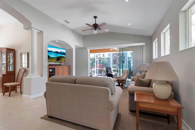 living area with lofted ceiling, ornate columns, ceiling fan, and baseboards