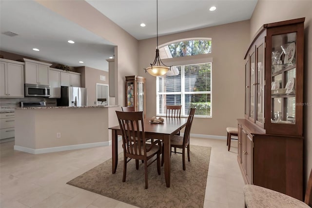 dining space with visible vents, baseboards, and recessed lighting