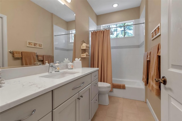 full bath with vanity, shower / tub combo, tile patterned flooring, and toilet