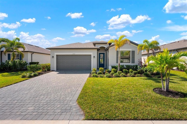 ranch-style home featuring a garage, decorative driveway, a front yard, and stucco siding