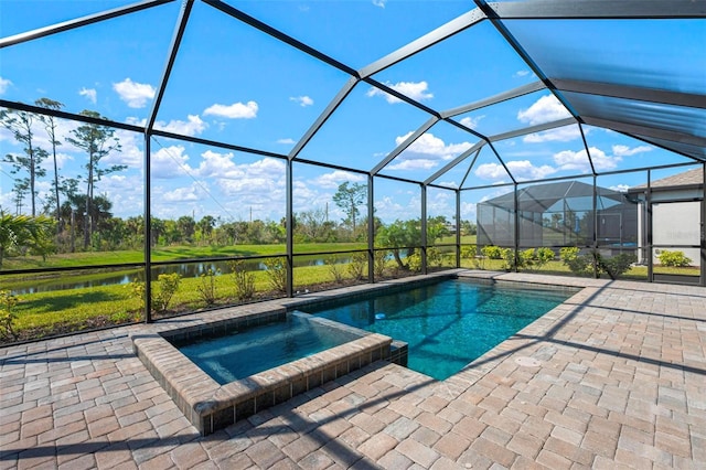 view of swimming pool with a water view, a patio, and a lanai