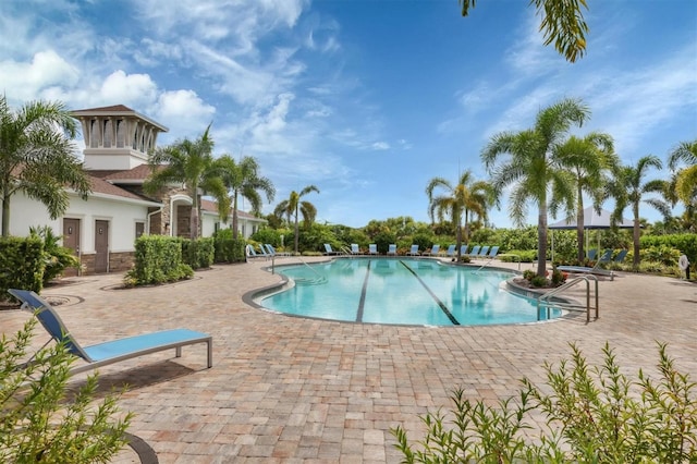 community pool with a patio