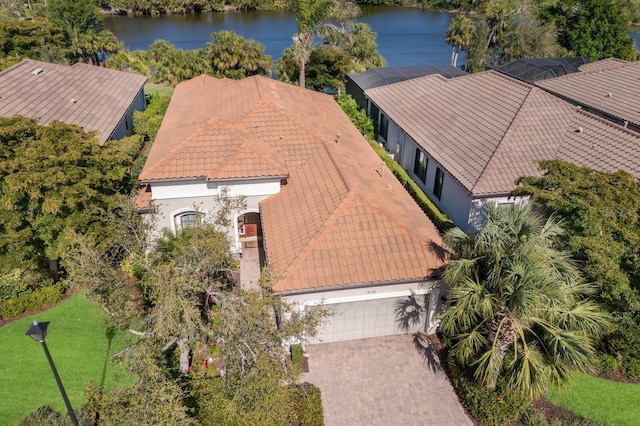 drone / aerial view with a water view